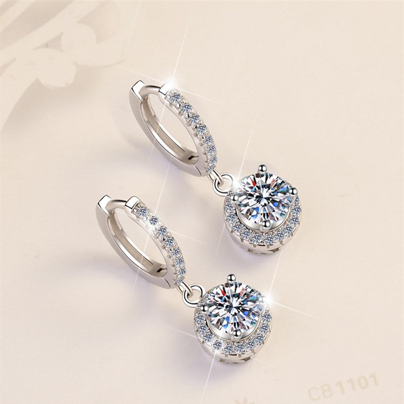 Moonlit Halo Moissanite Drop Earrings pair of moissanite earrings in S925 sterling silver - styling and detail view for ILU520 jewelry gifts
