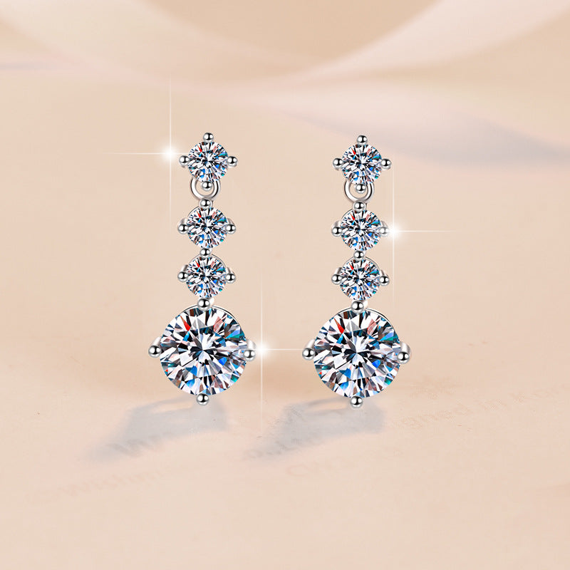 Starlight Cascade Moissanite Drop Earrings pair of moissanite earrings in S925 sterling silver - styling and detail view for ILU520 jewelry gifts