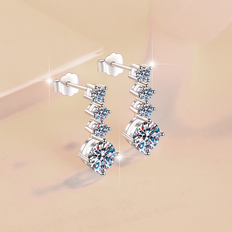 Starlight Cascade Moissanite Drop Earrings pair of moissanite earrings in S925 sterling silver - styling and detail view for ILU520 jewelry gifts